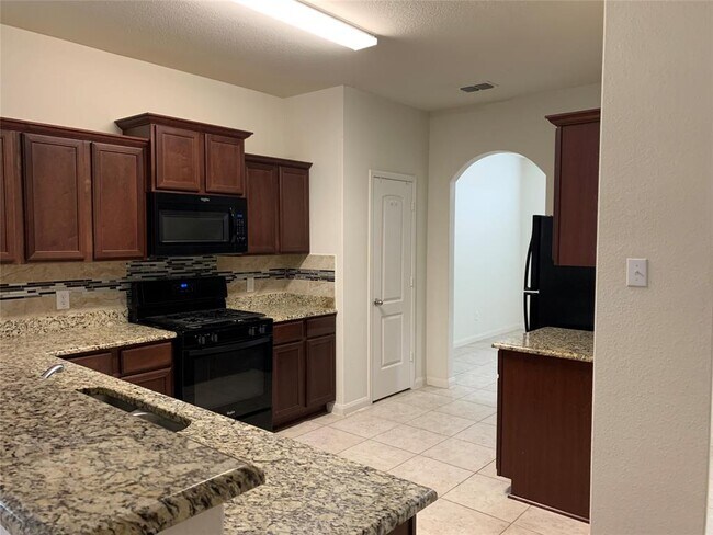 Building Photo - 9425 Bald Cypress St