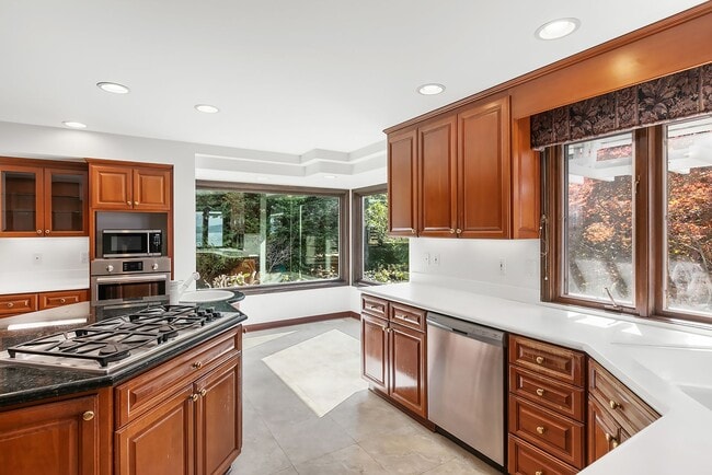 Building Photo - Normandy Park House: Picturesque Views, Sport Court, Upgrades Throughout