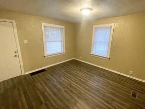 Building Photo - 4 Bedroom With 1.5 car garage/workshop combo (has electricity)