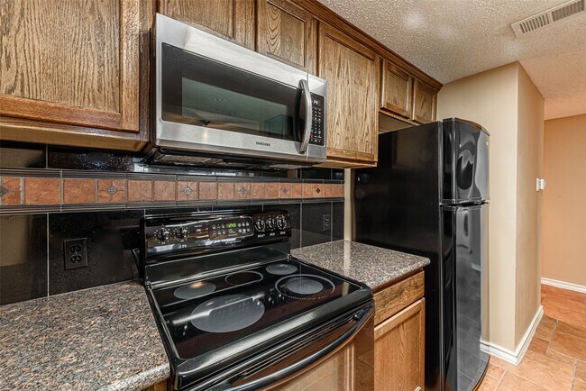 Building Photo - 14655 Champion Forest Dr Dr