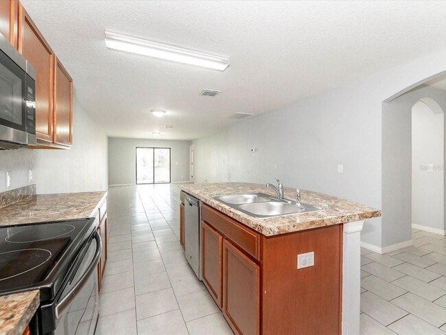 Building Photo - 5555 Maggiore Blvd