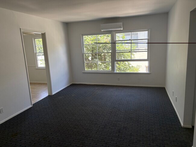 Building Photo - 1005 N Sweetzer Ave