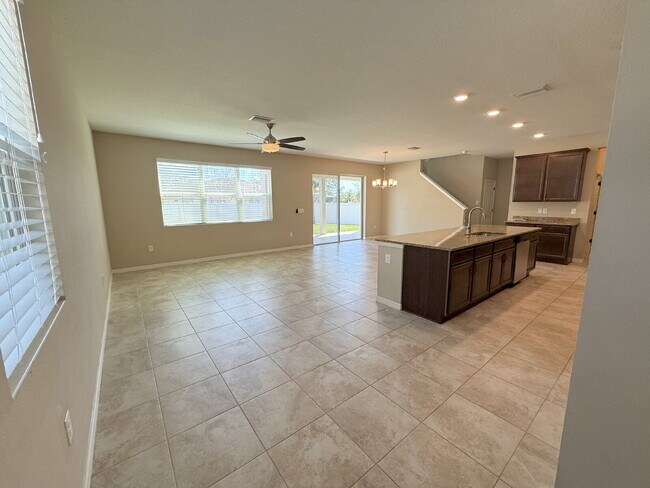 Building Photo - Spacious 4-Bedroom Retreat with additional office/den in the Heart of Trinity!