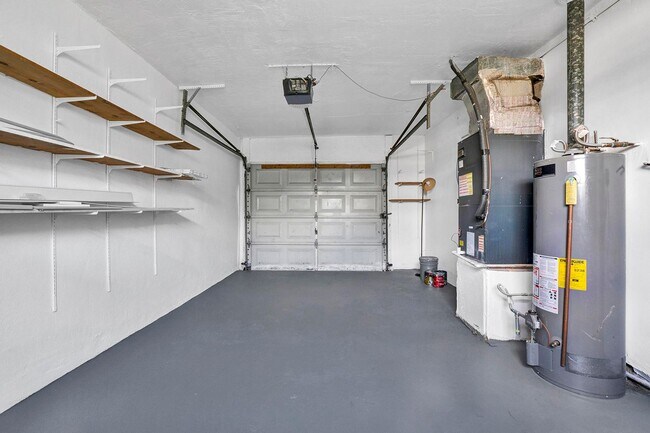 Building Photo - Sunrise Gem: Updated 2-Bed, 2-Bath with Garage Parking