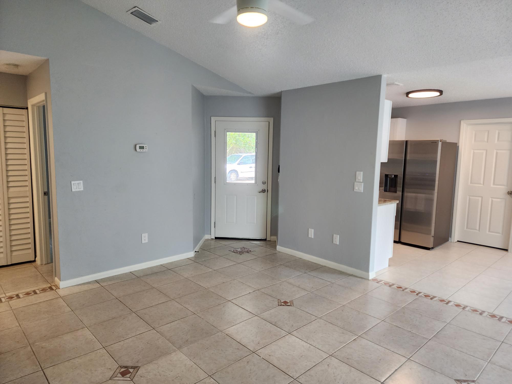 LIVING ROOM TO FRONT DOOR - 13 Empress Ln