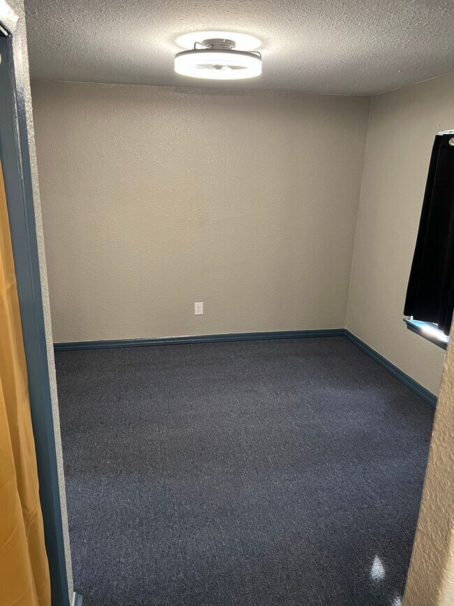 Building Photo - Remodeled Suburban Apartment