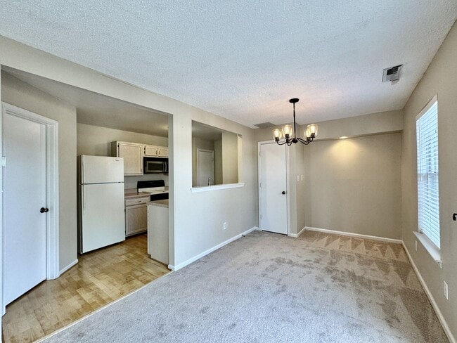 Building Photo - Available 06-15-25! End-Unit Condo w/2 Pri...