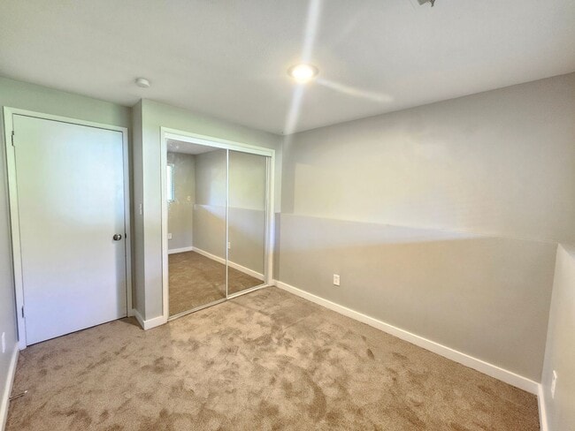 Building Photo - 1721 E 58th Ave