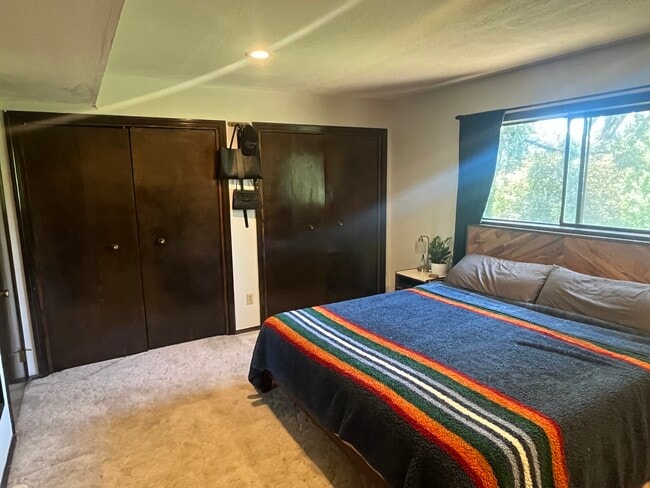 Master bedroom is very large with room for King sized bed - 17221 SE Oatfield Rd