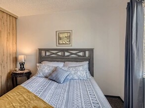 The Secondary Bedroom - Country Green Apartments