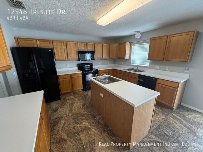 Building Photo - 12948 Tribute Dr