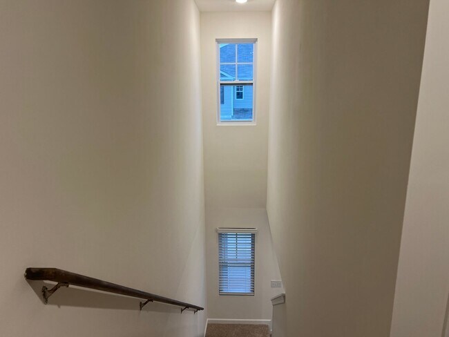Building Photo - Beautiful New Construction 3 bedroom 2.5 Condo   with garage- Water, trash & sewer incuded!