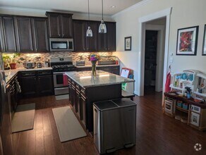 Building Photo - Spacious Four Bedroom Available July 3