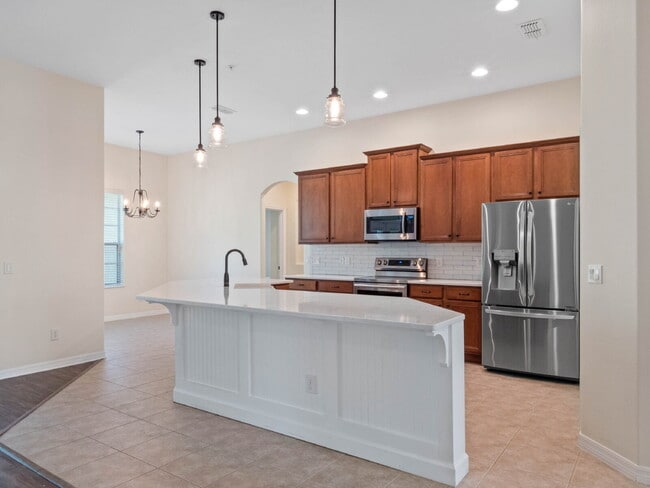 Building Photo - Spacious 4-Bedroom Pool Home with 3 Full B...