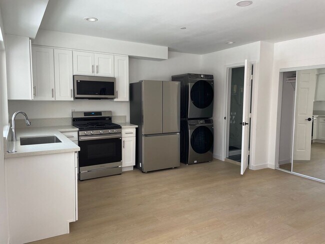 Building Photo - 1 Month Free!Brand New Thai Town Studio w/ All Utilities Included!