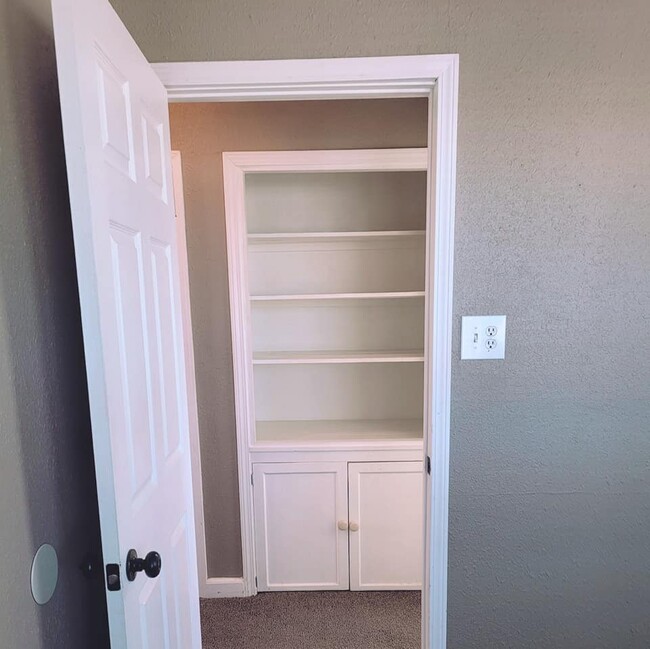 Book Case - 1210 W Texas Ave