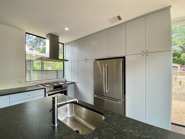 Building Photo - Modern Luxury Near the Lake – Sleek Design...