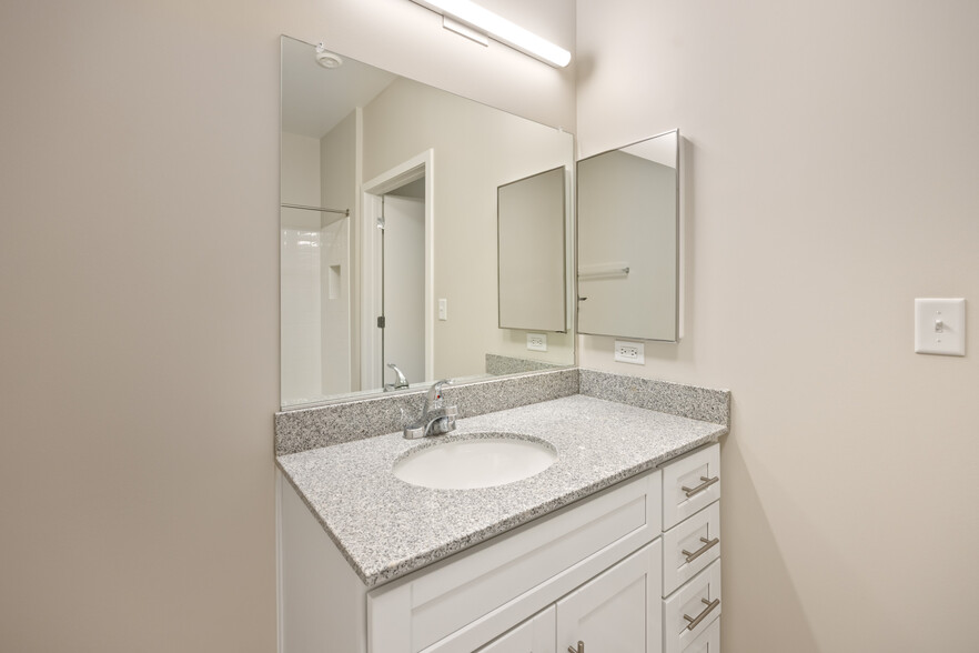 Style 1A Bathroom Vanity w/Granite Countertops - Homes at Oxon Hill Senior 62+ Apartments