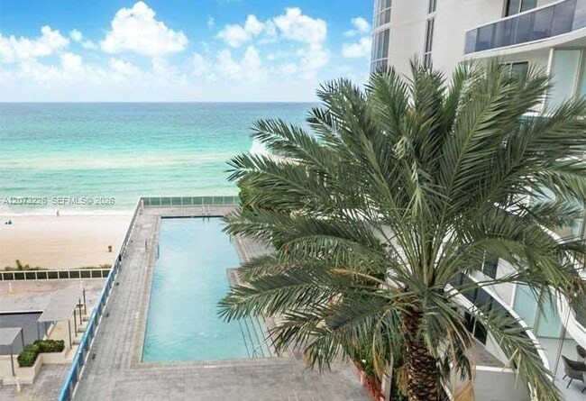 Building Photo - 15811 Collins Ave