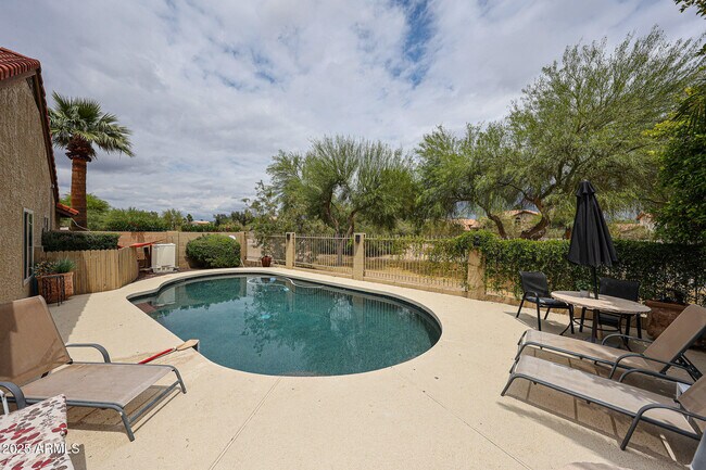Building Photo - 9085 E Windrose Dr