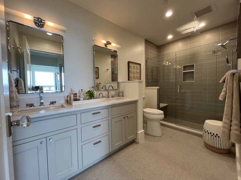 Beautiful Master Bath with 3 shower heads and the tallest right-height toilet. - 387 Commercial St