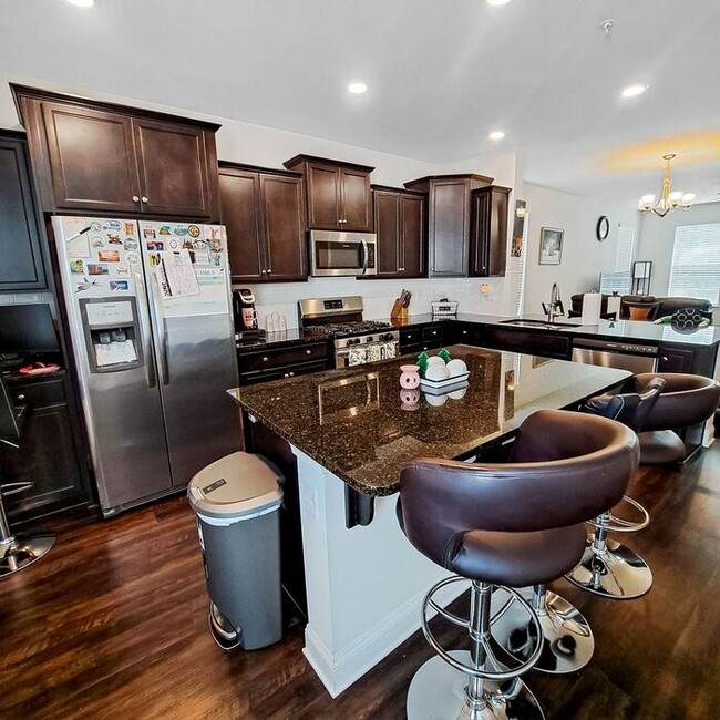 Building Photo - Gorgeous 3-Level End Unit Townhome, 3 Bedr...