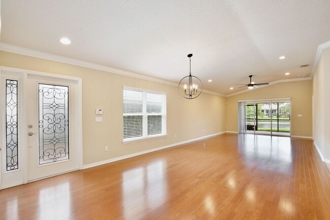 Building Photo - AGENT SHOWINGS ONLY! Gorgeous 2/2 + Den Mediterranean Villa with Waterfront Screened Patio and 2-...