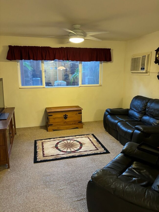 Building Photo - Move-In Ready 2BR/2BA Condo – Fully Furnished, AC, Washer/Dryer, Parking