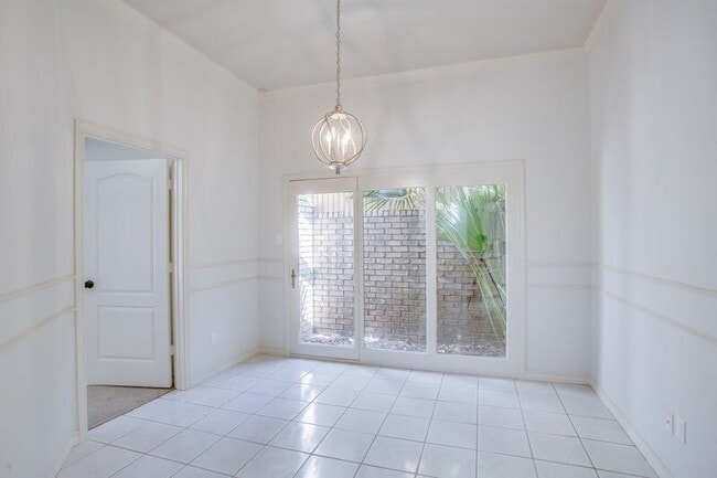 Building Photo - Over the top garden home - Half off the fi...