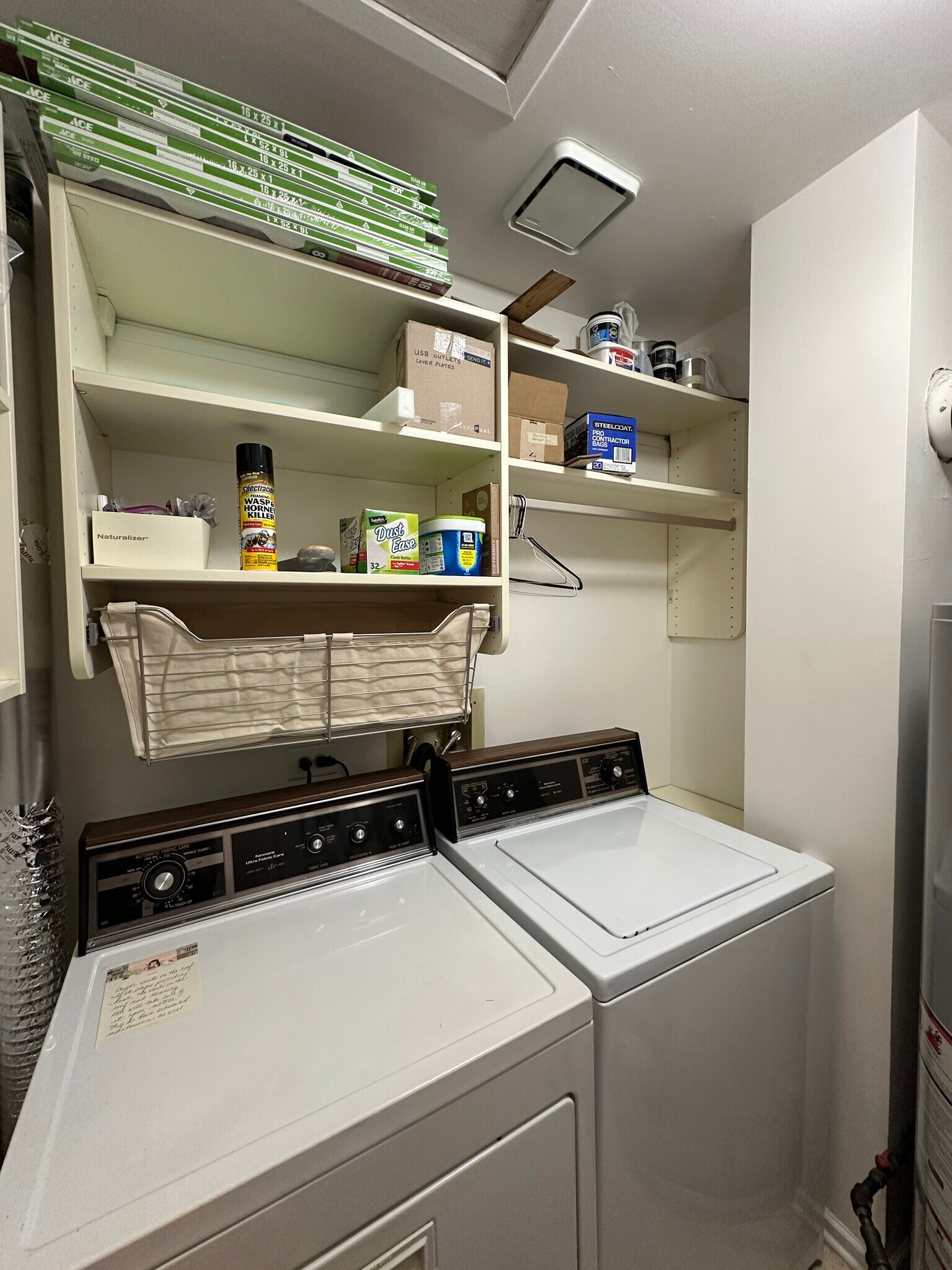 Washer/dryer. INSPIRED CLOSETS shelving, rod, pull out basket - 174 Hemingway Ct