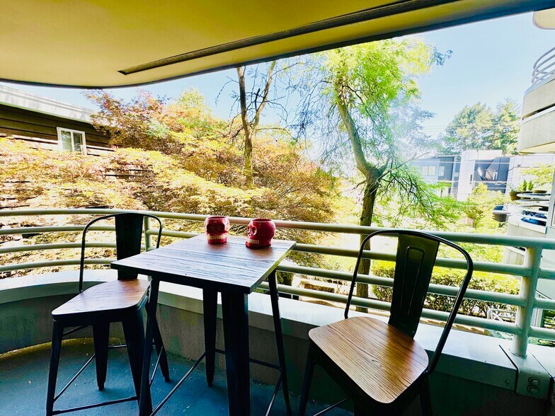 Take in the fresh air and greenery as you enjoy your morning coffee on your own private balcony - 2145 Dexter Ave N