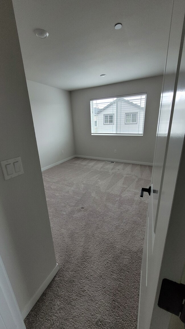 Building Photo - 7065 NW Bountiful Terrace