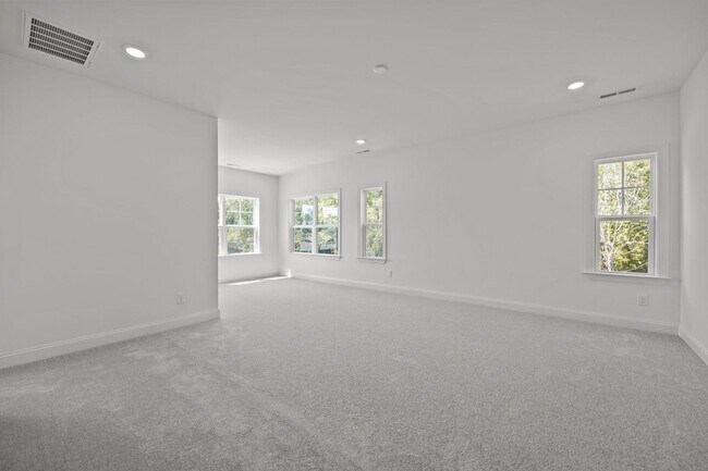 Building Photo - Brand-New 5BR/4BA in Knightdale’s Stoneriver – Luxury Living with 3-Car Garage