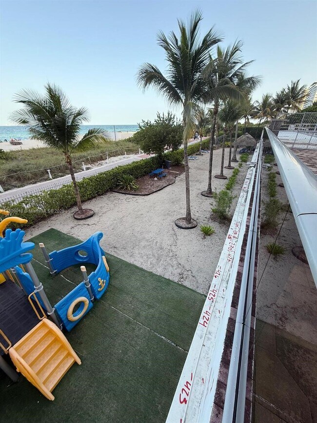 Building Photo - 6039 Collins Ave