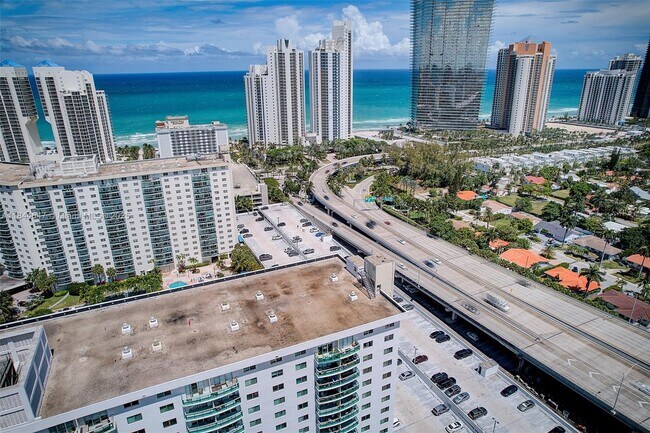 Building Photo - 19380 Collins Ave