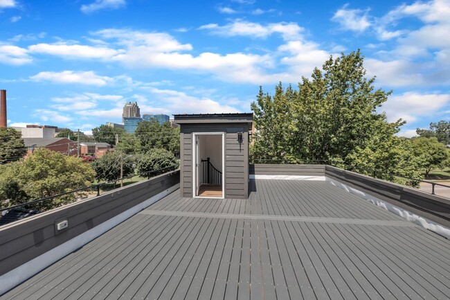 Building Photo - Modern New Construction Townhome with Roof...