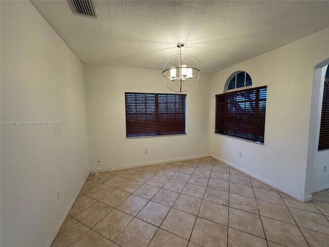 Building Photo - 12701 SW 49th Ct