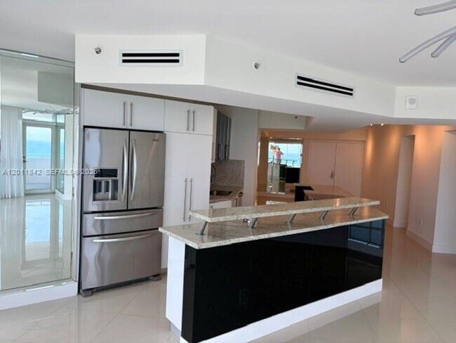 Building Photo - 6301 Collins Ave