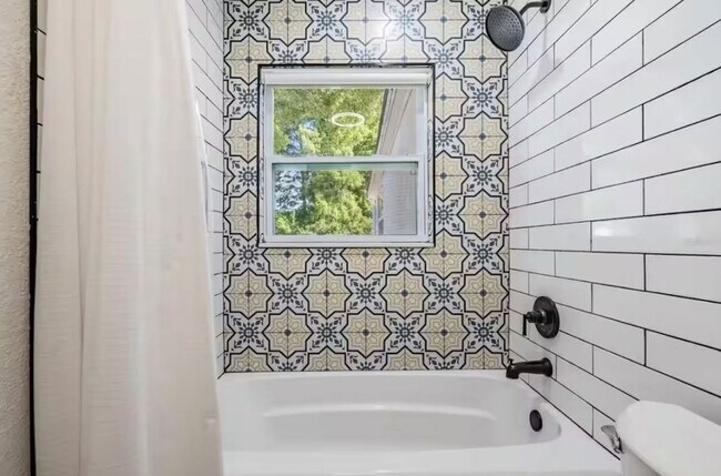 Building Photo - Utilities Included - (DECEMBER ONLY) Furni...