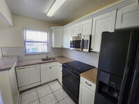 Building Photo - 2400 NW 52nd Ave