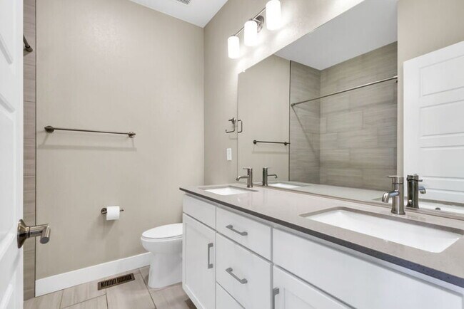 Building Photo - 1555 W 67th Ave