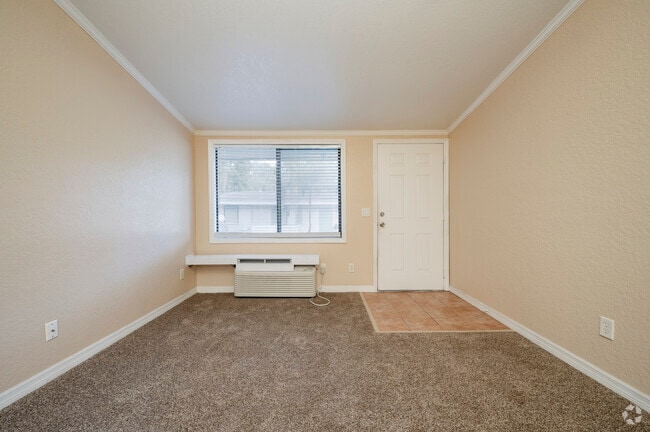 1 BD, 1 BA, 576 SF - Living Room - The Bungalows of Port Orange