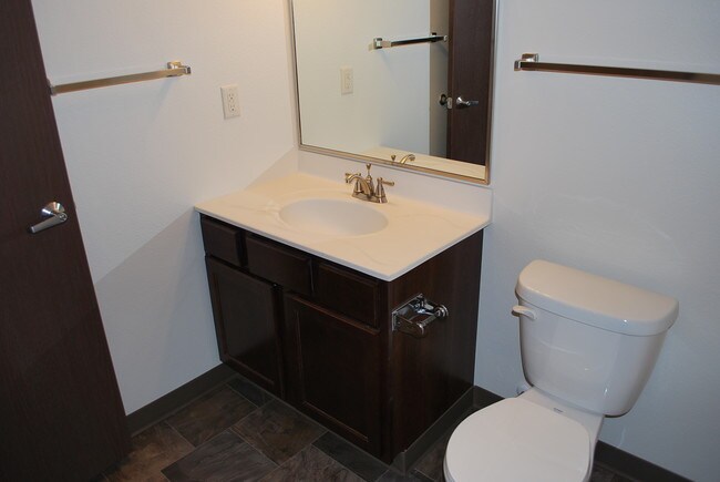 Building Photo - Essential Living - market rate apartments