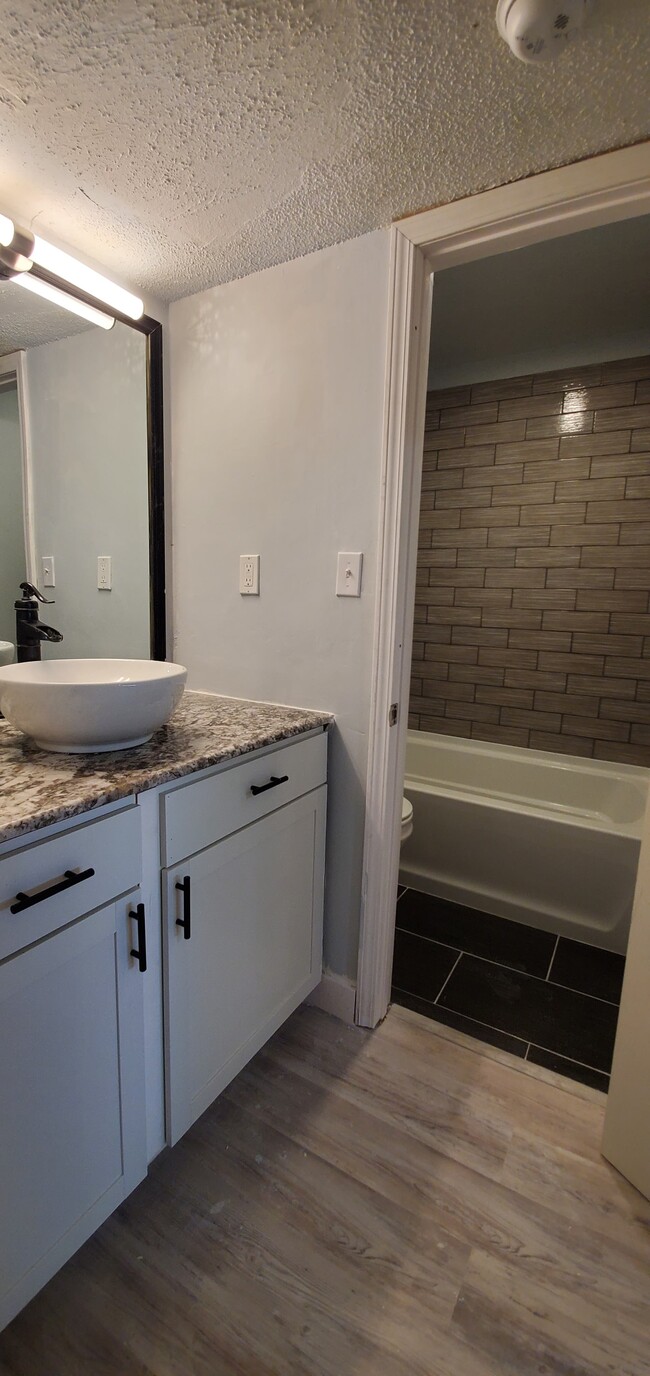 Tiled Bathroom with Deep Tub - 210 Pelham Rd