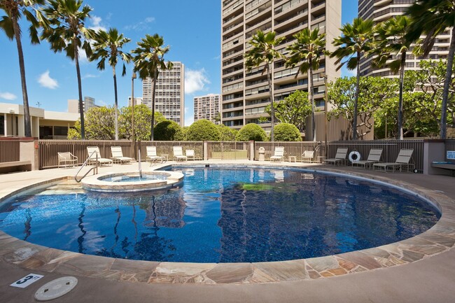 Building Photo - Royal Iolani Corner Unit - 2 PRK w/ ALL Ut...