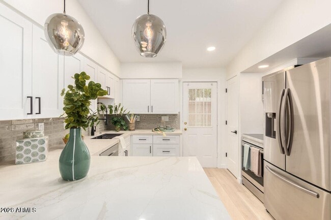 Building Photo - 3505 E Campbell Ave