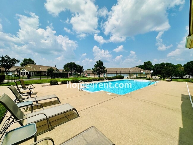Building Photo - Maintenance FREE, Ranch Style Townhome w/ ...