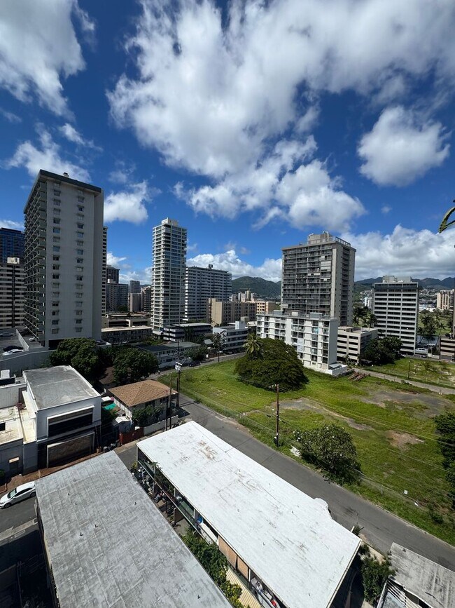Building Photo - Large 2/2 Waikiki Condo with Parking, Lanai, A/C & W/D in unit!