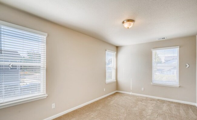 Building Photo - LOVELY 4-BEDROOM TOWNHOUSE IN WALKABLE SW LONGMONT NEIGHBORHOOD