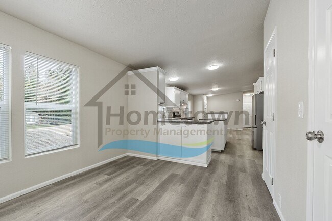 Building Photo - 3 Bedroom 2 Bathroom Home with Off-Street Parking Available in Sagle, Idaho!